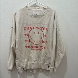 Aerie Cream and red smiley face “Thank You For Visiting” sweatshirt
Medium